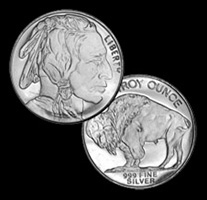 A silver buffalo coin and an Indian head penny