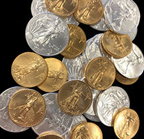 A bunch of gold and silver coins are stacked together